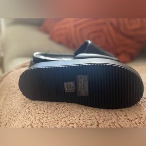 Faux platform leather slides